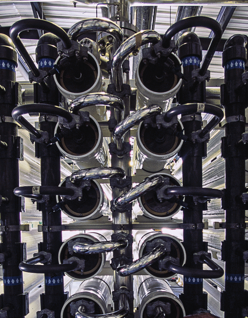 Industrial water treatment infrastructure with valve arrays and pipes